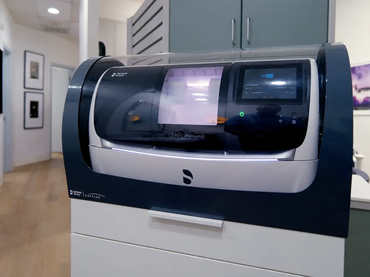 CEREC milling unit used to produce same-day crowns at Hammons Family Dental in Georgetown, TX