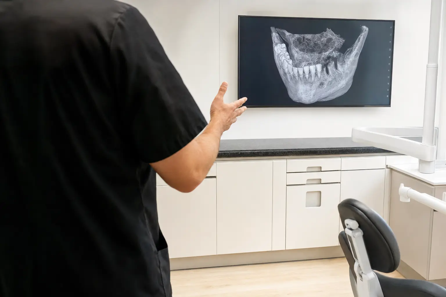 Reviewing a 3D CBCT scan before implant placement at Hammons Family Dental in Georgetown, TX